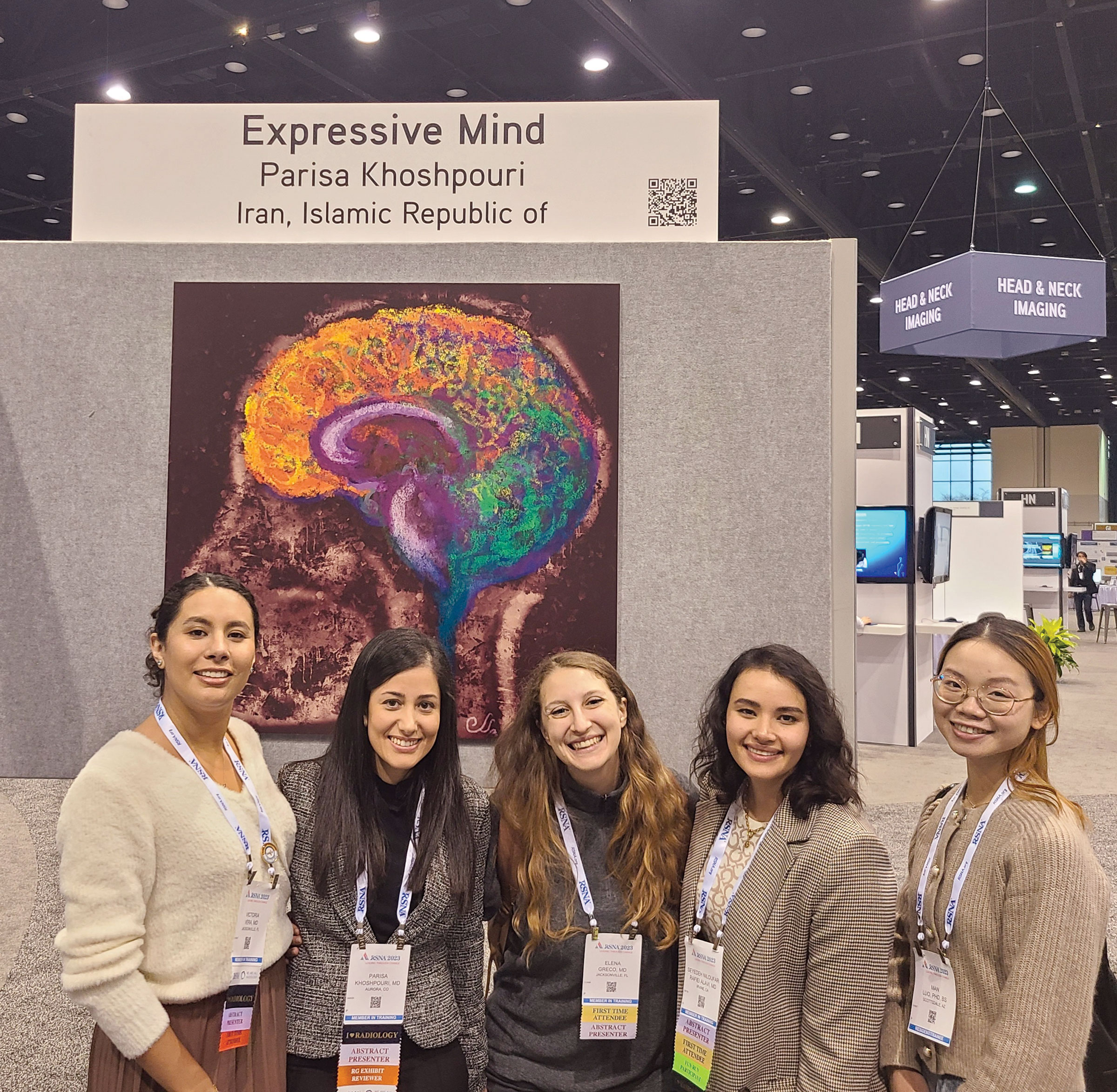 A group of doctors meeting in person in the Learning Center at the RSNA Annual Meeting.