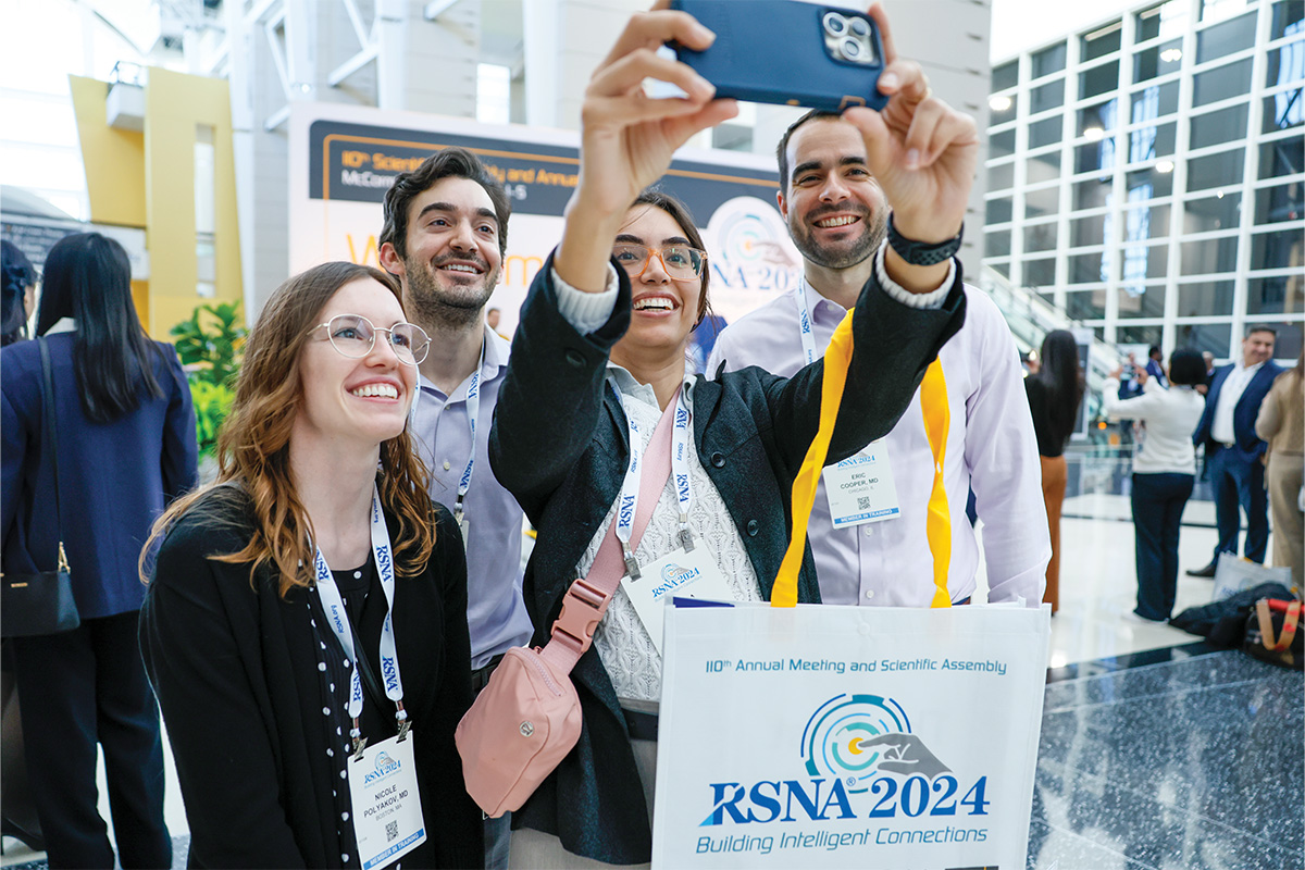Group taking photo at RSNA 2024